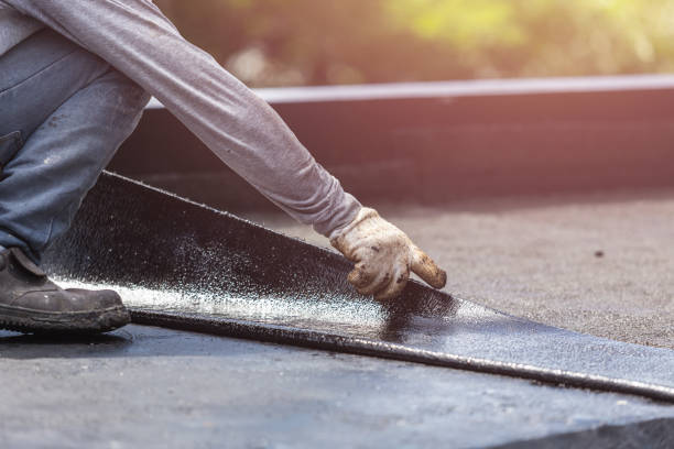Professional Basement Waterproofing technician working in Oberlin, KS